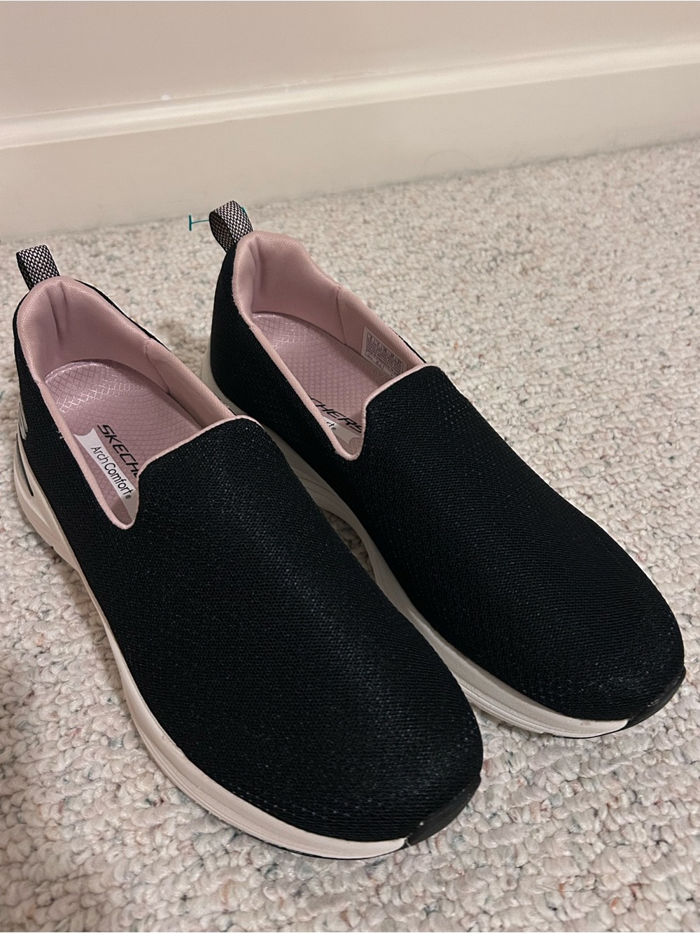 Skechers Black Slip-On Sneakers with Pink Interior